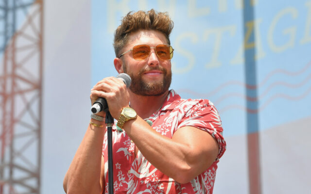 CHRIS LANE HAS A (LITERAL) RUN-IN WITH PARKED CAR